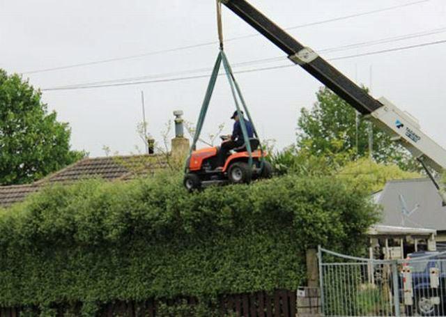 File:Low voltage danger mower.jpg