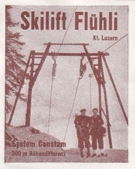 A Cinderella stamp depicting a Constam T-bar that reads: Skilift Fluhli Kt. Luzern, System Constam, 300 m Hohenditterenz. The stamp was affixed to the flap of a letter that was postdated June 14,1946.