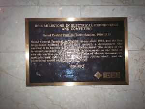 Plaque mounted on marble wall.jpg