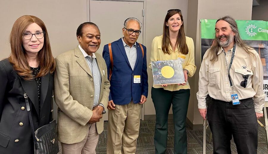 Mr Bala Prasanna presents the Book to Dr Christine Girtain NJ State Teacher of the Year