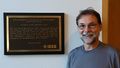 Brian Berg, R6-Milestone Coordinator, at SRI International with ARPANET Milestone Plaque
